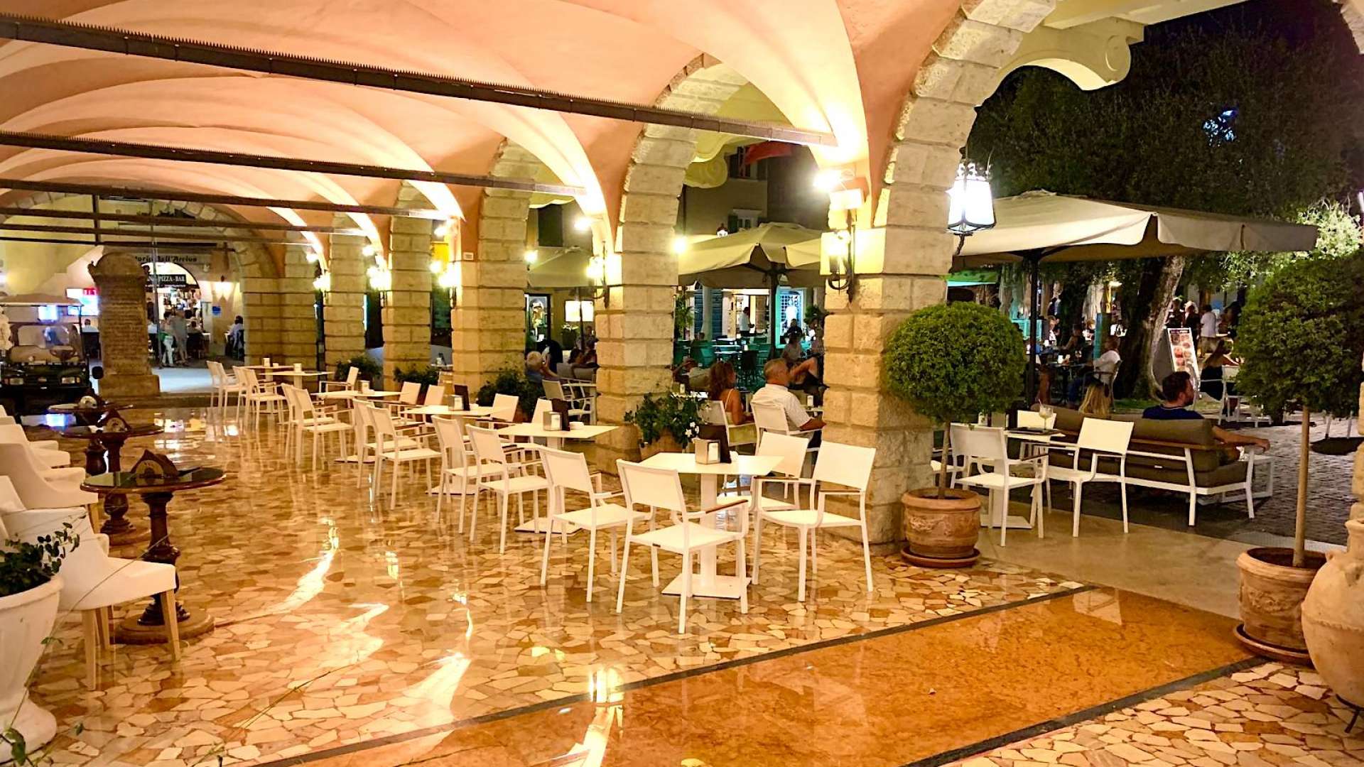 The Caffè under the arcades in the evening